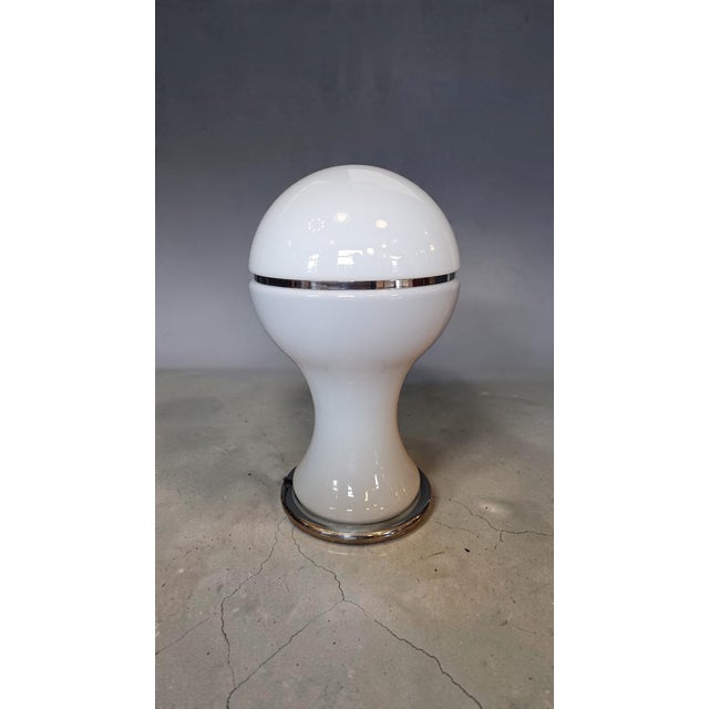 Table or floor lamp with dual switches, mold-blown opaline glass structure with chrome-plated metal parts. designed by...