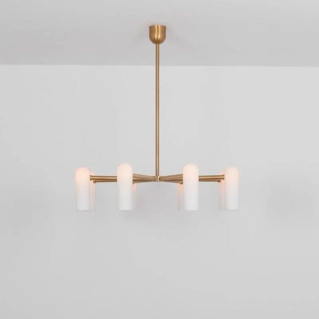 Odyssey round md brass chandelier by schwung dimensions: w 119 x d 119 x h 131 cm materials: solid brass and frosted glass...