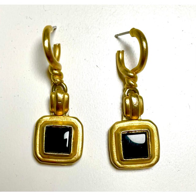 This is part of Chairish’s Costume Jewelry assortment. Roxanne Assoulin gold drop earrings i. Etruscan revival art deco...