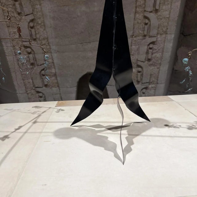 AMBIANIC presents 1960s Mobile Art Sculpture Calavera Skull manner of Alexander Calder unmarked 17.5 h x 27 w x 8 d...