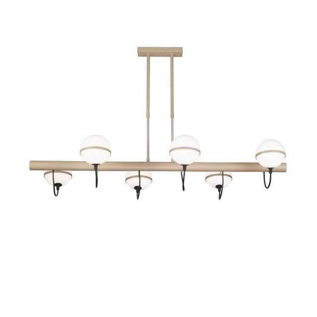 Italian horizontal chandelier with six white opaline glass globes held by champagne colored metal structure / Made in...