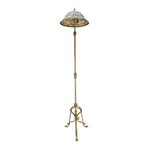 American Arts & Crafts Scrolled Leg Gilt Iron Floor Lamp & Slag Glass Shade Manner of Bradley Hubbard - a Pair