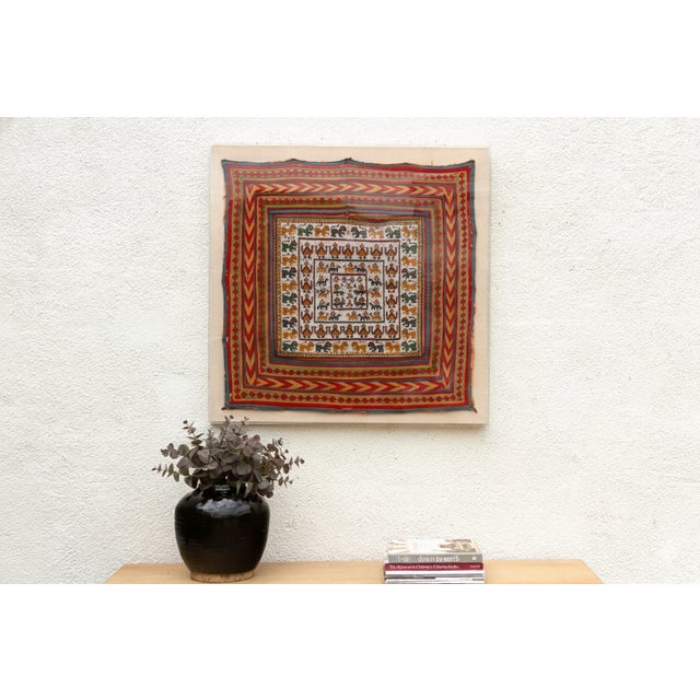 This mesmerizing 34-inch square textile panel is a genuine antique ritual cloth, likely originating from the highly...