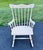 Vintage 1960s Child's White Wood Rocking Chair by Thayer Add a touch of nostalgic charm to your home with this vintage...
