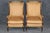 An exceptional and increasingly scarce pair of French Directoire bergère lounge chairs, these elegant seats embody the...