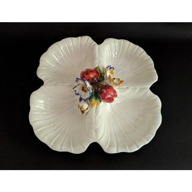 This Italian Capodimonte 4-section serving platter features an ornate center with multi-colored flowers and lady bugs. The...