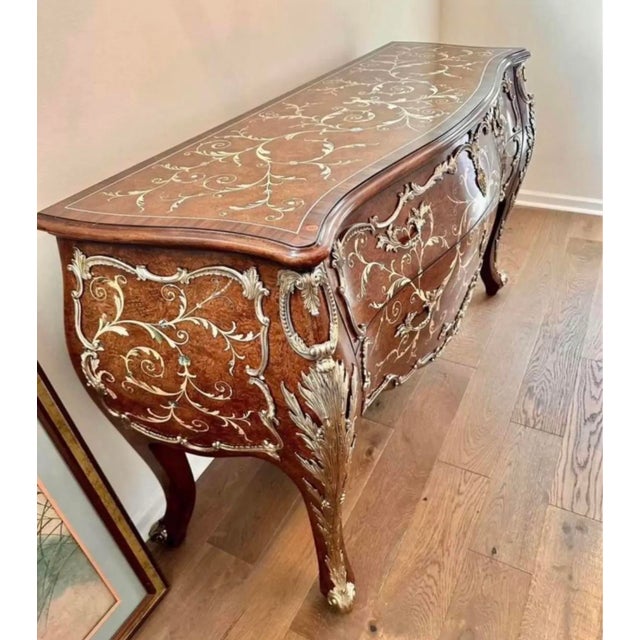 Number 25 of 50 made! A magnificent Anglian finish mahogany and marquetry bombe Commode, veneered in Chestnut burl...