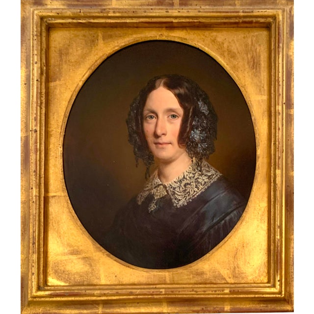 This is an original oil painting by Winsor And Newton, featuring a British lady portrait. It is medium-sized and framed,...