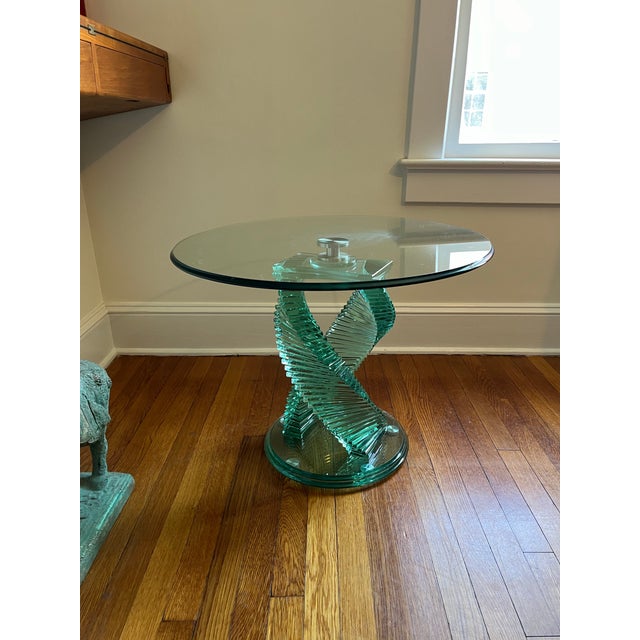 Vintage helix spiral stacked glass table. Twin helix spiral design, with stacked glass rectangles and steel hardware....