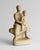 Evocative plaster sculpture depicting a seated mother cradling her child, crafted in the 1950s/60s by prominent Swedish...