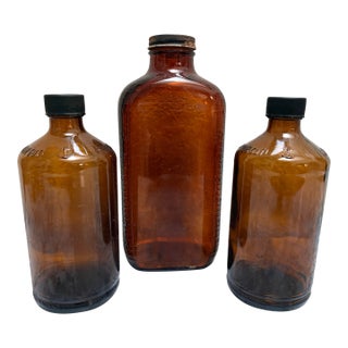 Vintage Rustic Brown Glass Apothecary Bottles, Set of Three For Sale