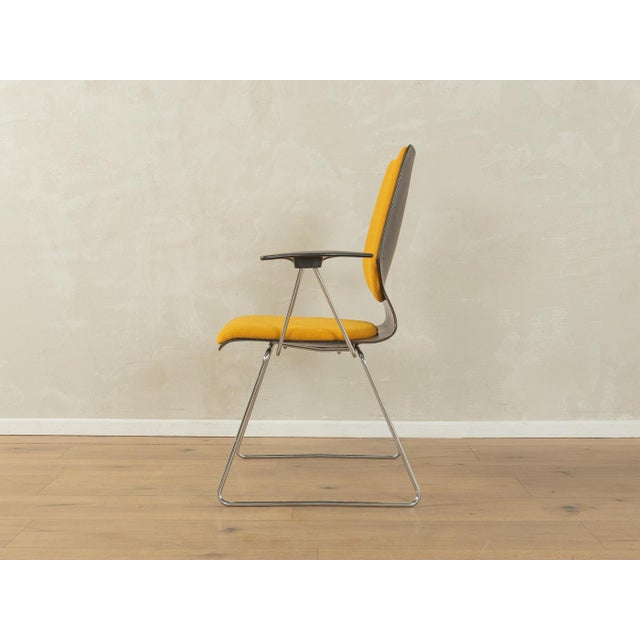 Rare chair from the 1970s by Flötotto. Tubular steel frame with a Pagwood seat shell. The chair has been reupholstered and...