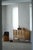 A charming low-profile sideboard crafted in oak and designed in the style of Henning Kjærnulf, Denmark, 1960s. The piece...