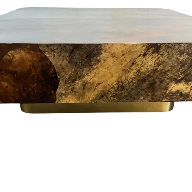 In the Manner of Aldo Tura Vintage Laminated Goatskin Coffee Table Brass Band Base Accent Brown & Tan Overall Tones