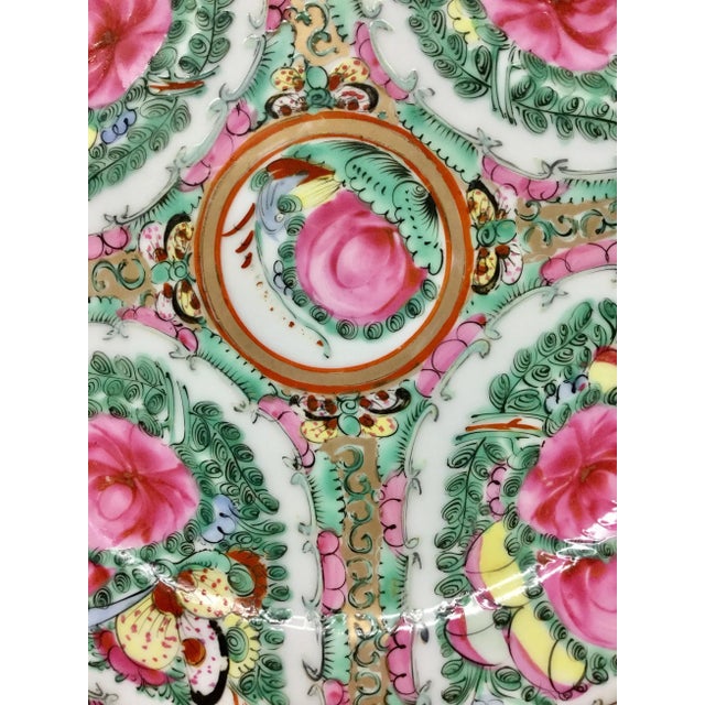 Decorative plate hand painted in Macau. This pretty vintage plate has the colors of the season. Brighten up any room with...