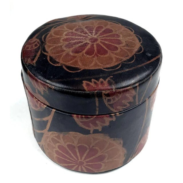 A lovely hand created leather artisan trinket box with lid. Just the right size for your dressing valet. Acetate lining...