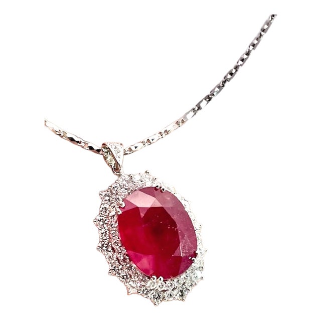 Huge Ruby Faceted 17.59 Carats W/ 2.21 Diamond Surround For Sale