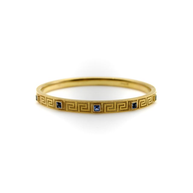 Is there anything more classic than a Greek key design? This 14k gold Victorian bracelet bangle has a Greek key border...