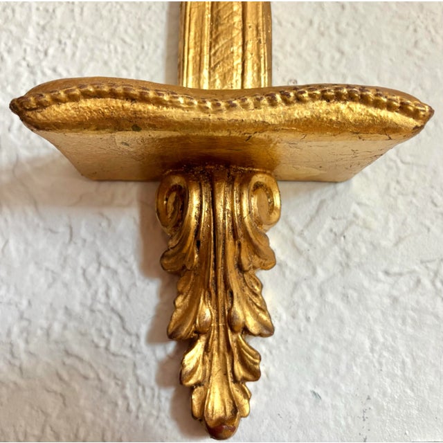 Charming carved gilt-wood plate holder with a delightful pillow shape for the plate ledge. Made circa the mid 20th...