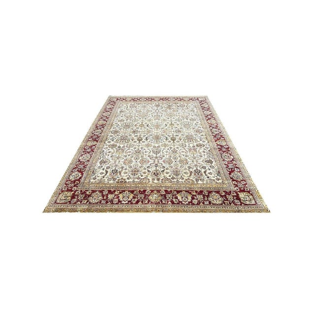 The unique 12x15 Persian-style area rug will transform your living space and add traditional elegance and beauty to your...