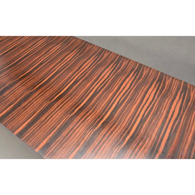 This is a striking organic modern exotic kingwood console table with clean lines. There are two available. It has a nicely...