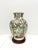 A Mid 20th Century Chinese Export style decorative porcelain vase with stand, unbranded. A beautiful multi-color porcelain...