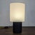 Upgrade your space with this Room & Board table lamp. It features a sturdy black oak wood base and a clean white fabric...