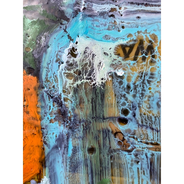 An encaustic painting over antique ephemera collage on cradled panel.