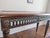 Theodore Alexander Morgan Hill Console Table. Solid mahogany featuring an inlaid marble top and (bronze and/or brass)...
