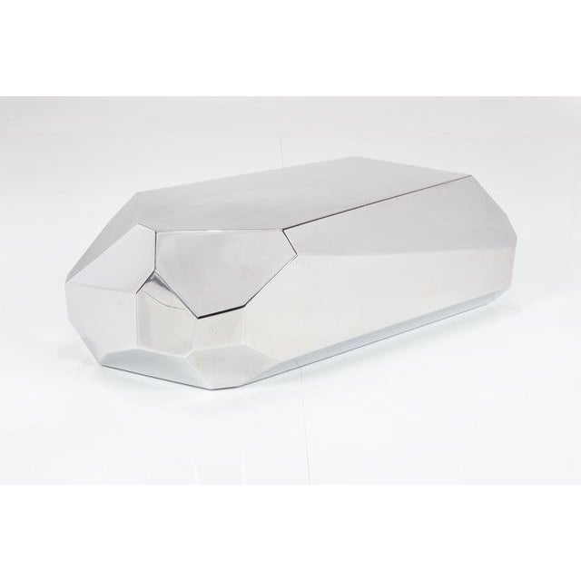 Mirrored stainless steel table in the style of designer Arik Levy. There are three tables available in various sizes (sold...