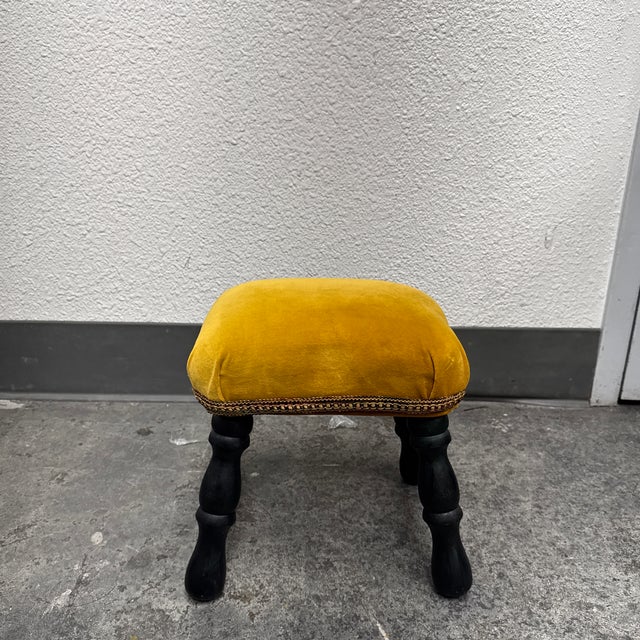 Design Plus Gallery presents an English Victorian Style Footstool. This petite footstool has a golden yellow velvet...