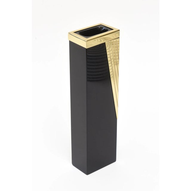 This sleek and gorgeous vintage Italian Murano black glass and brass draped vase or bud vase has elements of art deco...