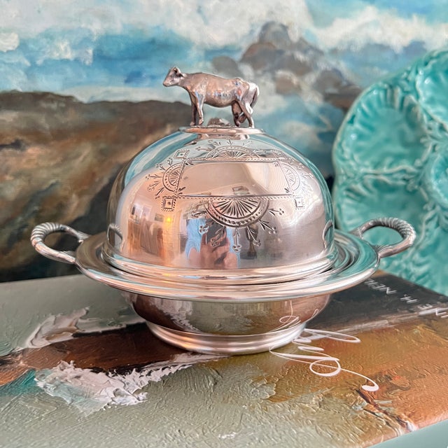 Add a touch of timeless elegance to your dining experience with this exquisite Antique Victoria Quadruple Silverplate...