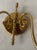 Good condition Add a touch of timeless elegance to your home with this vintage double-arm wall sconce. Crafted from...