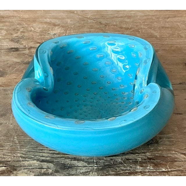 Presenting a charming vintage Italian art glass bowl, crafted in the spirit and style reminiscent of renowned Murano glass...