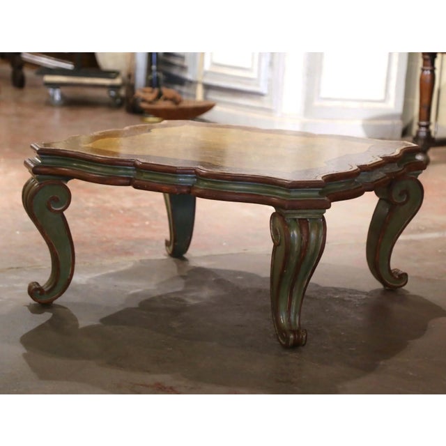 Full of character and sculptural appeal, this antique Louis XV style coffee table features a distinctive Rococo design and...