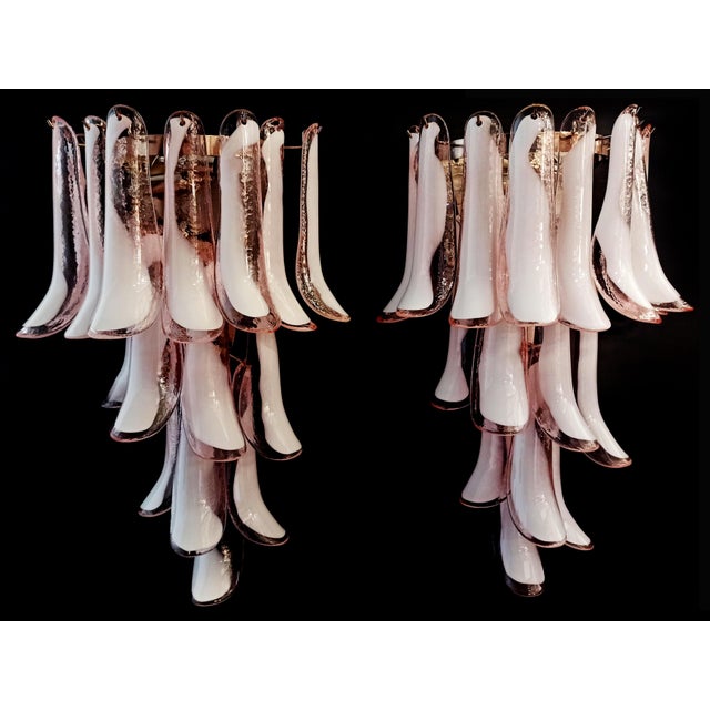 Set of Four Vintage Italian Murano wall sconces. Wall lights have 16 pink and white“lattimo” glasses (for each applique)...