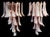 Set of Four Vintage Italian Murano wall sconces. Wall lights have 16 pink and white“lattimo” glasses (for each applique)...