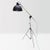 An intriguing industrial lamp with tripod legs. Versatile, as it can be adjusted in height and various angles, and its...