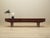 The lowboard was made in the 1970s in Denmark. The structure is covered with walnut veneer. The legs and handles are made...