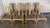 This is a charming set of eight carved wood dining chairs, including six side chairs and two armchairs, all in a classic...