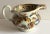 Great looking fine rare butterfly pattern gravy or creamer.