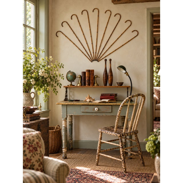 A wonderful collection of nine antique bamboo walking canes dating to the early 20th century. Each features a slender...