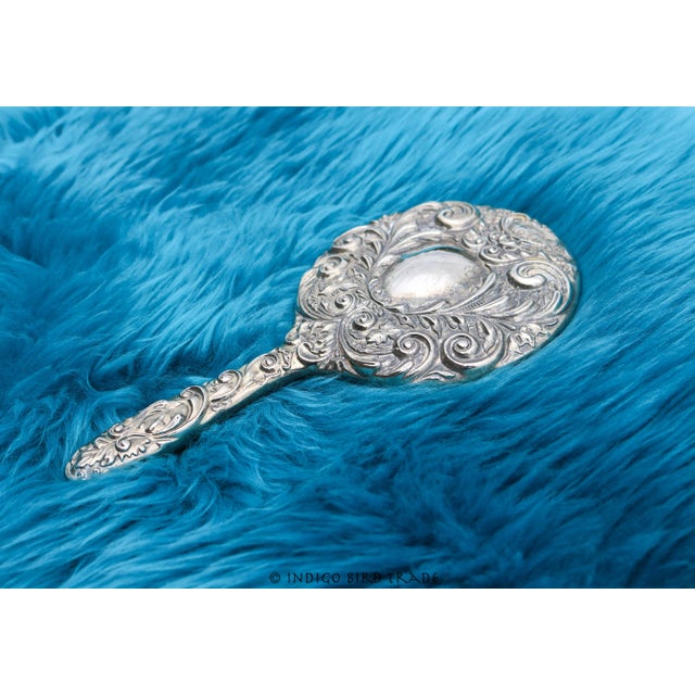 Antique Silver Plated Repousse Hand Mirror with Bird Magnificent silver plated hand mirror with a beautiful raised floral...