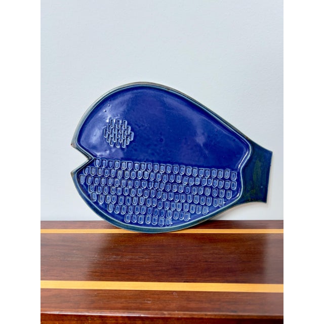 Fun and striking cobalt blue fish platter by iconic ceramicist David Gil. The fish is highly textured, and the blue glaze...