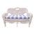 Vintage white wicker settee featuring beautifully detailed handwoven craftsmanship and an elegant scalloped silhouette....