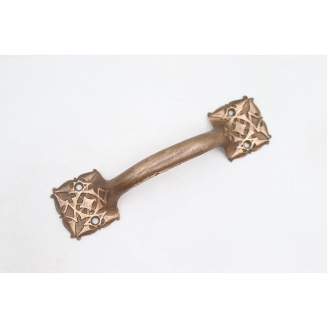Antique Gothic style bronze bridge lift handles that could be used on furniture or windows. The original mounting screws...