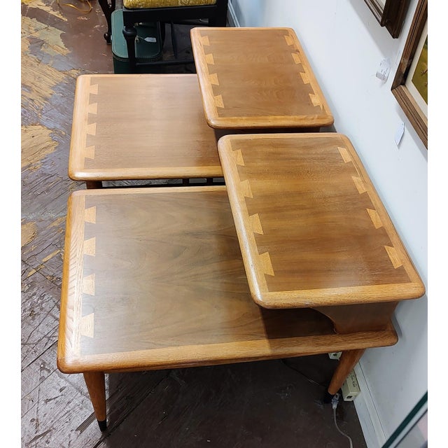Beautifully restored pair of Lane Acclaim two-tiered end tables. Signature dovetail design combines walnut and ash woods.....
