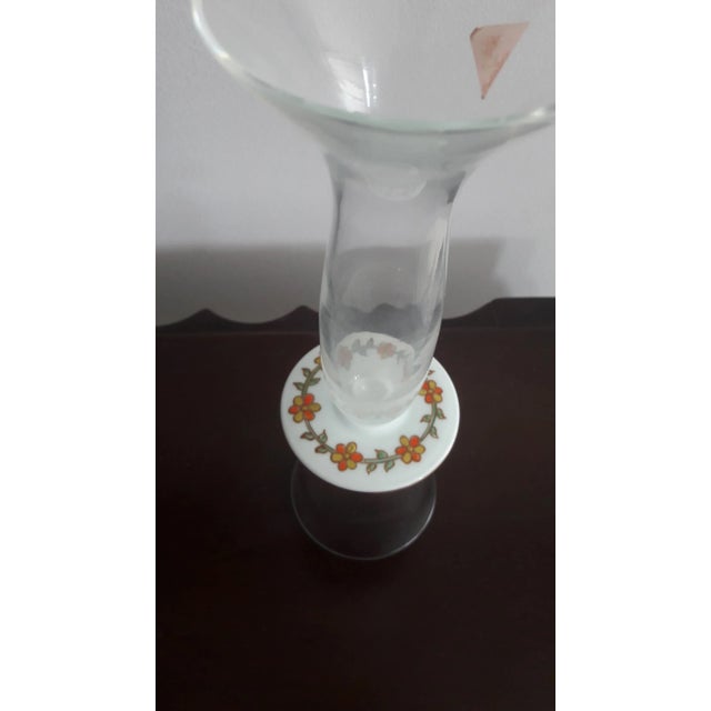 This Bořek Šípek glass centerpiece was produced by Ajeto. It is made of hand-blown glass with painted porcelain details.