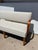 An Art Deco-style Bench made with Maple Wood. Slightly tapered legs and bentwood arms.